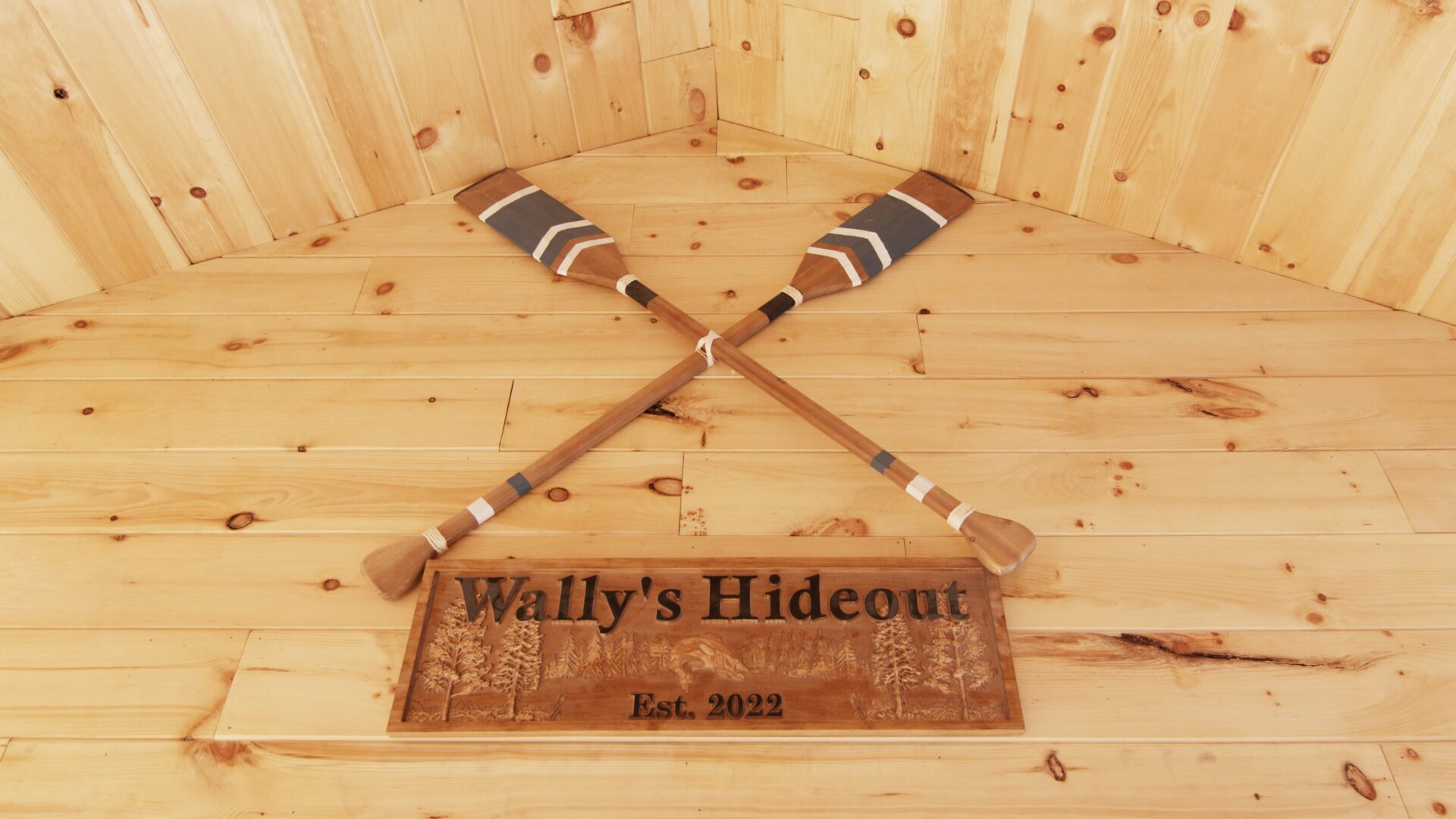 Wally's Hideout logo on the display